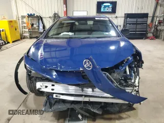 2023 Toyota Prius LE z VIN JTDACAAUXP3010661, wystawiony jako Copart lot #57996225 z przebiegiem 31 166 mil mil oraz Czysty tytuł • Clean title. Historia ofert i sprzedaży dostępna na DreamBid. Obrazek 5.