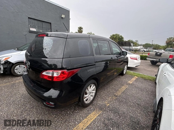 2015 Mazda 5 Sport z VIN JM1CW2BLXF0182880, wystawiony jako Copart lot #56959895 z przebiegiem 117 395 mil mil oraz Czysty tytuł • Clean title. Historia ofert i sprzedaży dostępna na DreamBid. Obrazek 4.