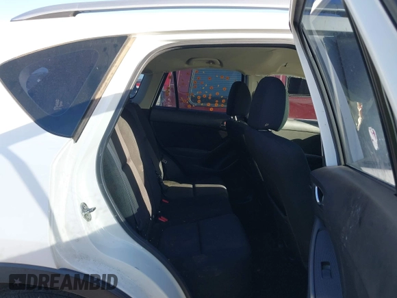 2015 Mazda CX-5 Sport with VIN JM3KE2BE3F0449722, listed as a IAAI auction lot 41825810 with 181,949 mi miles and . Bid and sale history available at DreamBid. Image 8.