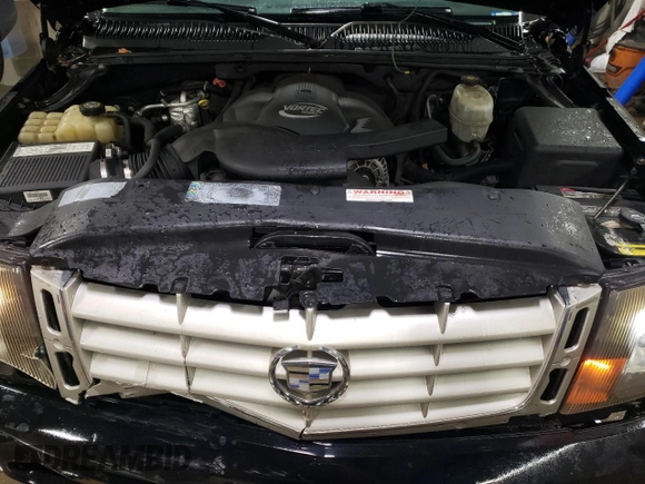 2003 Cadillac Escalade EXT z VIN 3GYEK63N33G118001, wystawiony jako Copart lot #86897574 z przebiegiem 223 953 mil mil oraz Szkoda całkowita • Salvage title. Historia ofert i sprzedaży dostępna na DreamBid. Obrazek 11.