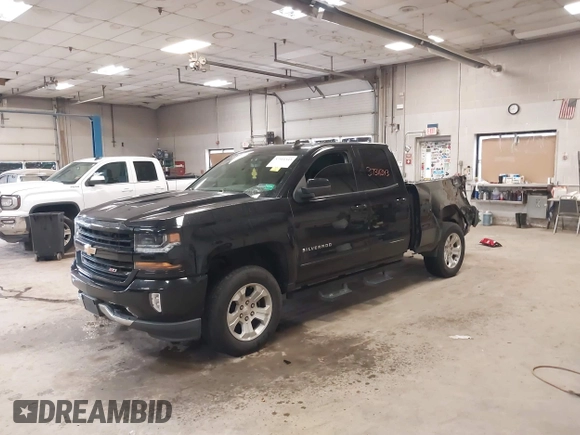2017 Chevrolet Silverado 1500 LT with VIN 1GCVKREC0HZ384747, listed as a IAAI auction lot 37311343 with 67,390 mi miles. Bid and sale history available at carsss.com. Image 18.
