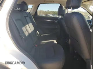 2021 Mazda CX-5 Grand Touring with VIN JM3KFBDM0M1440565, listed as a Copart auction lot 87089404 with 34,607 mi miles and Salvage Title. Bid and sale history available at carsss.com. Image 11.