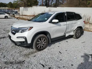 2021 Honda Pilot EX-L with VIN 5FNYF5H56MB033235, listed as a Copart auction lot 43137215 with 43,118 mi miles and Salvage Title. Bid and sale history available at carsss.com. Image 1.