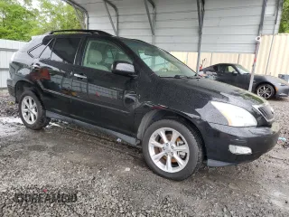 2009 Lexus RX 350 with VIN 2T2GK31U69C066742, listed as a Copart auction lot 52111105 with 135,181 mi miles and Salvage Title. Bid and sale history available at DreamBid. Image 4.