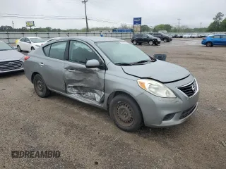 2014 Nissan Versa SV with VIN 3N1CN7AP7EL810919, listed as a Copart auction lot 52011795 with 106,561 mi miles and Salvage Title. Bid and sale history available at DreamBid. Image 4.