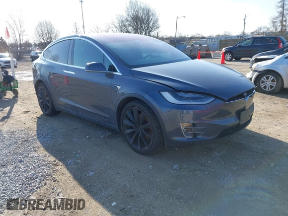 2020 Tesla Model X Long Range with VIN 5YJXCBE2XLF230629, listed as a IAAI auction lot 41925961 with 35,979 mi miles. Bid and sale history available at carsss.com. Image 1.