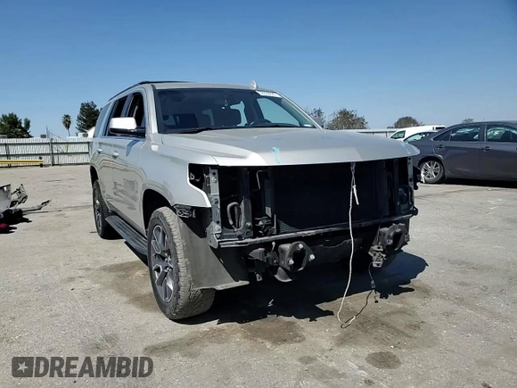 2016 Chevrolet Tahoe LS with VIN 1GNSCAKC7GR465949, listed as a Copart auction lot 50030625 with 136,608 mi miles and Salvage title. Bid and sale history available at DreamBid. Image 12.