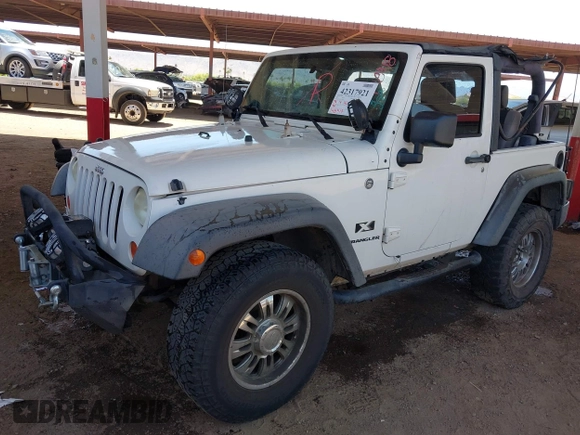 2007 Jeep Wrangler X with VIN 1J4FA24137L128418, listed as a IAAI auction lot 42317921 with 148,412 mi miles and . Bid and sale history available at DreamBid. Image 2.