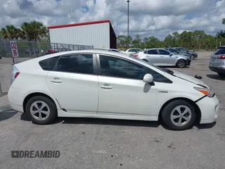2015 Toyota Prius Four z VIN JTDKN3DU5F0463995, wystawiony jako IAAI lot #42189475 z przebiegiem 152 585 mil mil oraz . Historia ofert i sprzedaży dostępna na DreamBid. Obrazek 13.