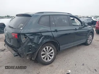 2019 Volkswagen Tiguan S with VIN 3VV1B7AXXKM002312, listed as a IAAI auction lot 42282809 with 80,781 mi miles and . Bid and sale history available at DreamBid. Image 4.