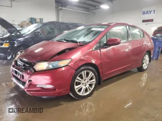 2010 Honda Insight LX with VIN JHMZE2H52AS034613, listed as a Copart auction lot 52701795 with 232,541 mi miles and Salvage Title. Bid and sale history available at DreamBid. Image 1.