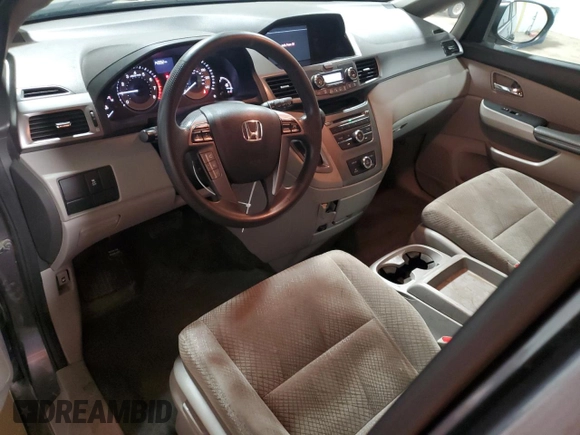 2015 Honda Odyssey LX with VIN 5FNRL5H25FB031580, listed as a Copart auction lot 48119255 with 143,552 mi miles and Salvage Title. Bid and sale history available at DreamBid. Image 8.