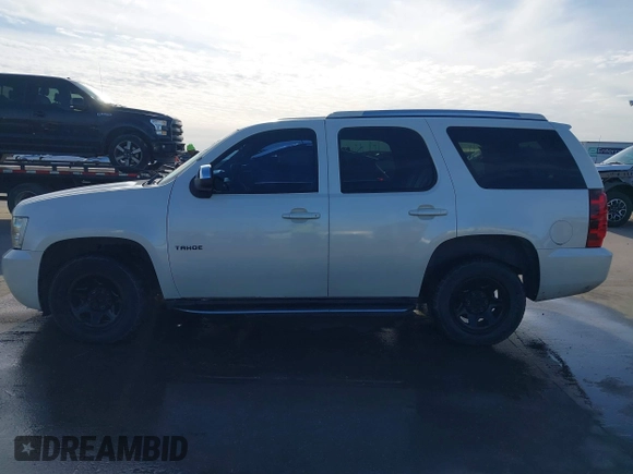 2012 Chevrolet Tahoe Commercial with VIN 1GNLC2E0XCR185593, listed as a IAAI auction lot 41217784 with 150,419 mi miles and . Bid and sale history available at DreamBid. Image 14.