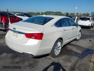 2014 Chevrolet Impala LTZ with VIN 2G1155S32E9206212, listed as a IAAI auction lot 40686005 with 76,750 mi miles. Bid and sale history available at carsss.com. Image 4.