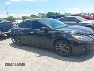 2018 Nissan Altima SV with VIN 1N4AL3AP8JC259494, listed as a IAAI auction lot 42041433 with 150,970 mi miles and . Bid and sale history available at DreamBid. Image 14.