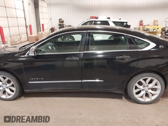 2018 Chevrolet Impala Premier with VIN 2G1125S36J9163755, listed as a IAAI auction lot 41969080 with 115,571 mi miles and . Bid and sale history available at DreamBid. Image 14.