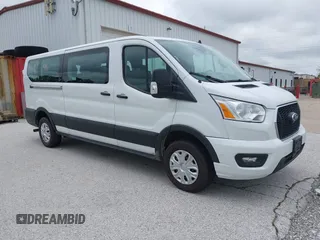 2021 Ford Transit Passenger XL z VIN 1FBAX2Y80MKA31866, wystawiony jako IAAI lot #42445861 z przebiegiem 65 193 mil mil oraz . Historia ofert i sprzedaży dostępna na DreamBid. Obrazek 1.