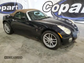 2007 Pontiac Solstice z VIN 1G2MB35B17Y128125, wystawiony jako Copart lot #56049485 z przebiegiem 167 817 mil mil oraz Czysty tytuł • Clean title. Historia ofert i sprzedaży dostępna na DreamBid. Obrazek 4.