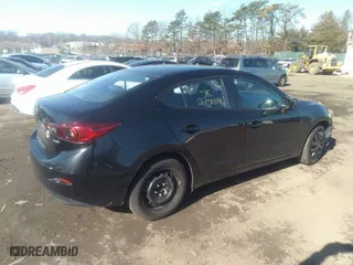2014 Mazda Mazda3 i Sport with VIN JM1BM1U73E1186502, listed as a IAAI auction lot 38724333 with 999,999 mi miles. Bid and sale history available at carsss.com. Image 4.