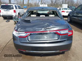2017 Lincoln Continental Reserve z VIN 1LN6L9RP0H5636532, wystawiony jako IAAI lot #41882280 z przebiegiem 98 733 mil mil oraz . Historia ofert i sprzedaży dostępna na DreamBid. Obrazek 16.