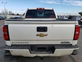2014 Chevrolet Silverado 1500 High Country with VIN 3GCUKTEC4EG335555, listed as a Copart auction lot 86993214 with 216,596 mi miles and Salvage Title. Bid and sale history available at carsss.com. Image 6.