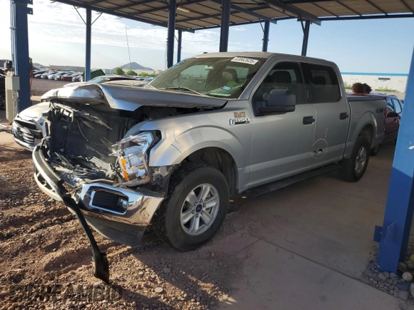 2018 Ford F-150 XL with VIN 1FTEW1E58JFA19859, listed as a Copart auction lot 63862625 with 77,463 mi miles and Salvage title. Bid and sale history available at DreamBid. Image 1.