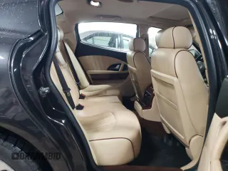 2012 Maserati Quattroporte S z VIN ZAM39JKAXC0065906, wystawiony jako Copart lot #52009945 z przebiegiem 55 058 mil mil oraz Szkody całkowita. Historia ofert i sprzedaży dostępna na DreamBid. Obrazek 10.