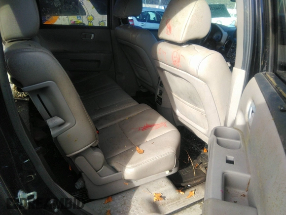 2012 Honda Pilot Touring with VIN 5FNYF3H90CB035309, listed as a IAAI auction lot 41063215 with 228,081 mi miles and . Bid and sale history available at carsss.com. Image 8.