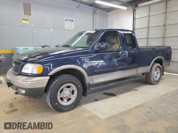 2002 Ford F-150 XL with VIN 1FTRX18L62NA69837, listed as a Copart auction lot 61581935 with 130,078 mi miles and Salvage title. Bid and sale history available at DreamBid. Image 1.
