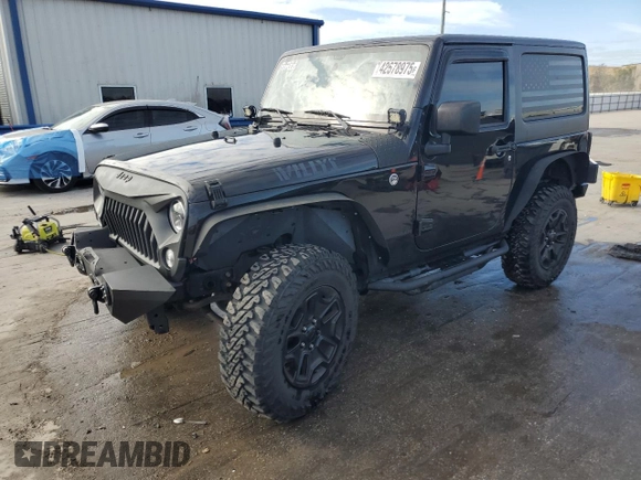 2017 Jeep Wrangler Willys Wheeler with VIN 1C4AJWAG1HL624254, listed as a Copart auction lot 42678975 with 51,936 mi miles and Salvage Title. Bid and sale history available at DreamBid. Image 1.