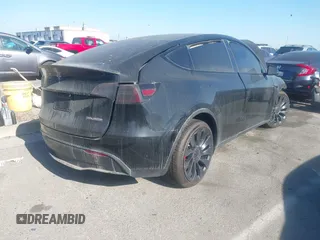 2024 Tesla Model Y Performance with VIN 7SAYGDEF7RF021464, listed as a IAAI auction lot 41225432 with Not Provided miles and . Bid and sale history available at DreamBid. Image 4.