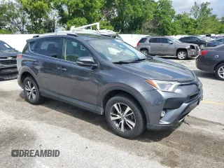 2016 Toyota RAV4 XLE with VIN JTMRFREV6GJ099720, listed as a Copart auction lot 60200585 with 148,801 mi miles and Salvage title. Bid and sale history available at DreamBid. Image 4.