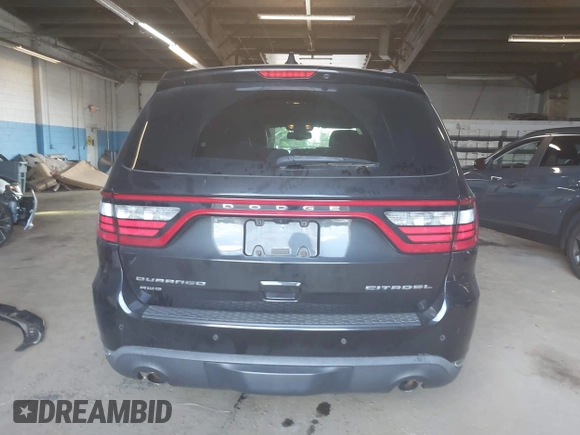 2014 Dodge Durango Citadel with VIN 1C4RDJEG1EC466162, listed as a IAAI auction lot 42560400 with 154,628 mi miles and . Bid and sale history available at DreamBid. Image 16.