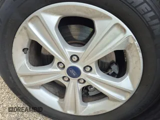 2016 Ford Escape SE z VIN 1FMCU9GX9GUC01824, wystawiony jako IAAI lot #42396853 z przebiegiem 57 608 mil mil oraz . Historia ofert i sprzedaży dostępna na DreamBid. Obrazek 25.