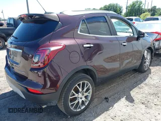 2018 Buick Encore Sport Touring with VIN KL4CJ1SB1JB641530, listed as a IAAI auction lot 42057859 with 151,364 mi miles. Bid and sale history available at carsss.com. Image 4.