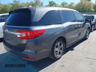 2018 Honda Odyssey EX-L z VIN 5FNRL6H7XJB067694, wystawiony jako IAAI lot #42177338 z przebiegiem 159 670 mil mil oraz . Historia ofert i sprzedaży dostępna na DreamBid. Obrazek 4.