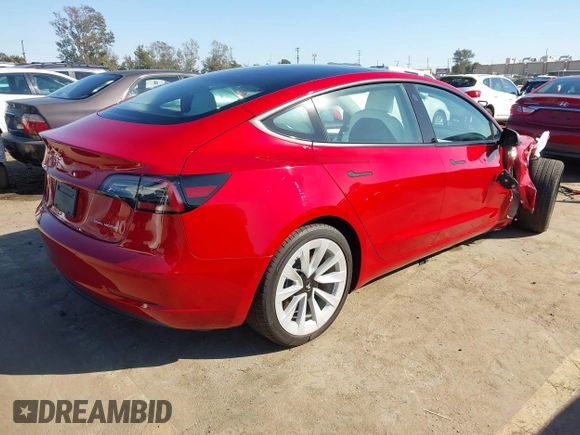 2021 Tesla Model 3 Long Range with VIN 5YJ3E1EBXMF990242, listed as a IAAI auction lot 41674222 with 24,554 mi miles and . Bid and sale history available at DreamBid. Image 4.