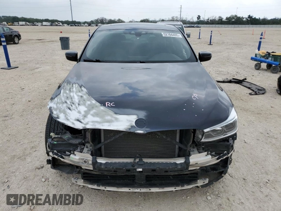 2018 BMW 6 Series 640i xDrive z VIN WBAJV6C52JBJ99507, wystawiony jako Copart lot #52184495 z przebiegiem 142 145 mil mil oraz Szkoda całkowita • Salvage title. Historia ofert i sprzedaży dostępna na DreamBid. Obrazek 5.