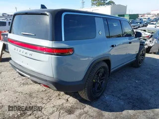 2024 Rivian R1S Adventure with VIN 7PDSGBBA8RN043516, listed as a IAAI auction lot 41675732 with 1 mi miles. Bid and sale history available at carsss.com. Image 4.