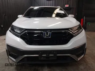 2021 Honda CR-V Touring with VIN 7FART6H98ME024238, listed as a IAAI auction lot 42341911 with 50,757 mi miles and . Bid and sale history available at DreamBid. Image 12.