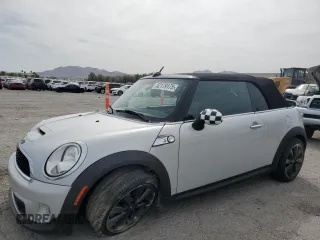 2014 MINI Convertible S with VIN WMWZP3C53ET707205, listed as a Copart auction lot 52179175 with 101,209 mi miles and Salvage Title. Bid and sale history available at DreamBid. Image 1.