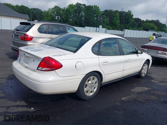 2007 Ford Taurus SE with VIN 1FAFP53U07A115368, listed as a IAAI auction lot 42290697 with 206,884 mi miles and . Bid and sale history available at DreamBid. Image 4.