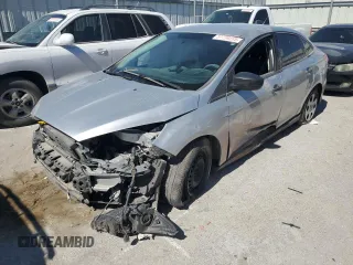 2017 Ford Focus S z VIN 1FADP3E20HL287087, wystawiony jako Copart lot #57738255 z przebiegiem Nie podano mil oraz Szkoda całkowita • Salvage title. Historia ofert i sprzedaży dostępna na DreamBid. Obrazek 1.