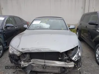 2015 Audi A5 Premium Plus z VIN WAUMFAFH6FN006946, wystawiony jako IAAI lot #42188356 z przebiegiem 147 402 mil mil oraz . Historia ofert i sprzedaży dostępna na DreamBid. Obrazek 13.