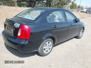 2006 Hyundai Accent GLS with VIN KMHCN46C36U018237, listed as a IAAI auction lot 41916524 with 92,427 mi miles. Bid and sale history available at carsss.com. Image 4.