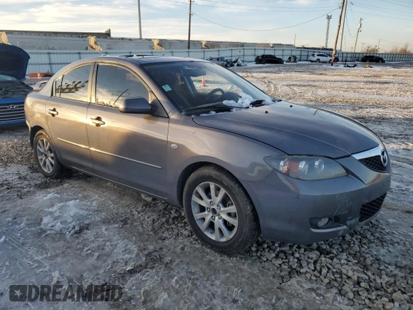 2007 Mazda 3 i Touring with VIN JM1BK32F571676258, listed as a Copart auction lot 87883545 with 141,203 mi miles and Salvage Title. Bid and sale history available at DreamBid. Image 4.