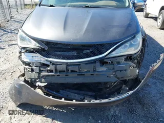 2017 Chrysler Pacifica Limited with VIN 2C4RC1GG1HR512911, listed as a IAAI auction lot 41850887 with 147,403 mi miles and . Bid and sale history available at DreamBid. Image 6.