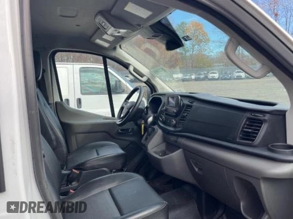 2023 Ford Transit Cargo with VIN 1FTYE1Y8XPKB26711, listed as a Copart auction lot 87334874 with 31,745 mi miles and Salvage Title. Bid and sale history available at DreamBid. Image 5.