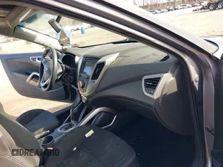 2013 Hyundai Veloster w/Black Int with VIN KMHTC6AD5DU172964, listed as a IAAI auction lot 41768827 with 102,782 mi miles and . Bid and sale history available at DreamBid. Image 5.