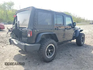 2015 Jeep Wrangler Unlimited Freedom с VIN 1C4BJWDG1FL609850, выставлен на аукционе Copart как лот 55169065 с пробегом 97 415 миль миль и Чистый • Clean title. История ставок и продаж доступна на DreamBid. Изображение 3.